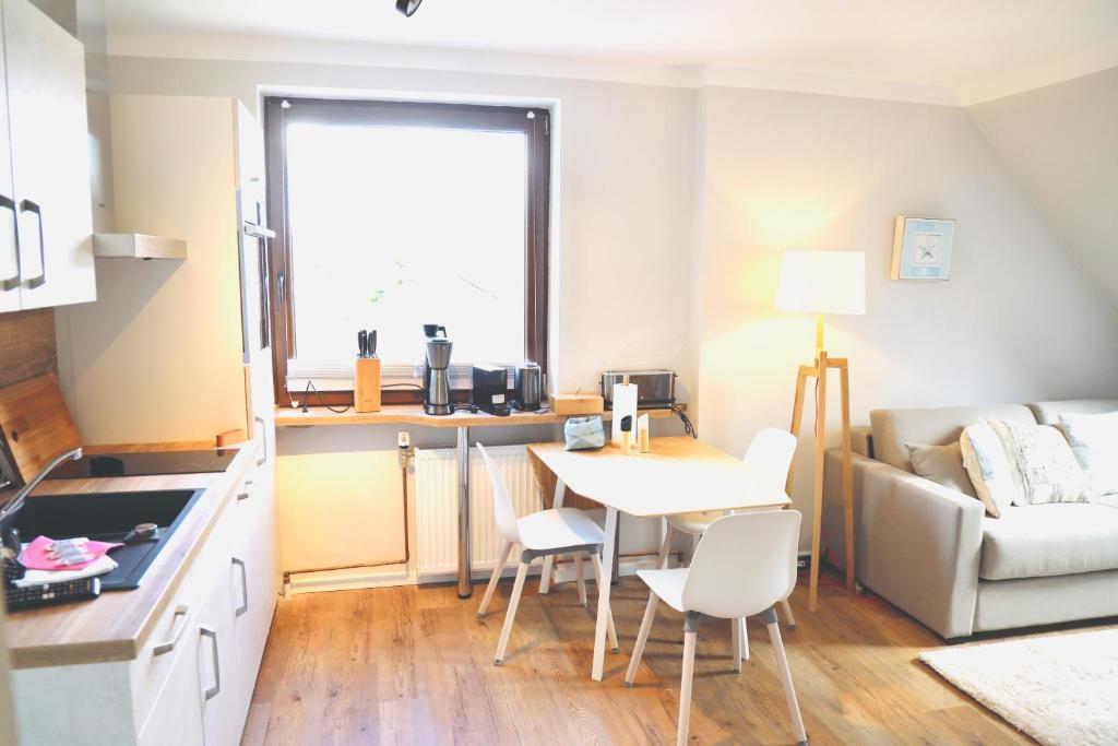 Kuchyň nebo kuchyňský kout v ubytování Apartments Meerzeit C