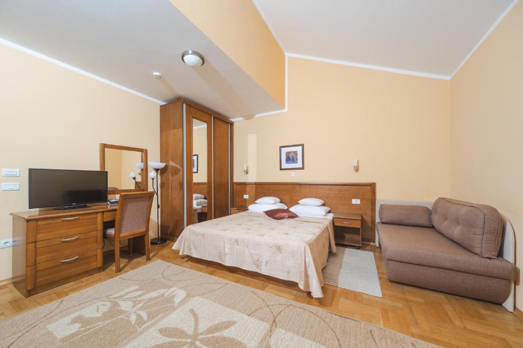 TV i/ili zabavni centar u objektu Hotel Stella di Mare