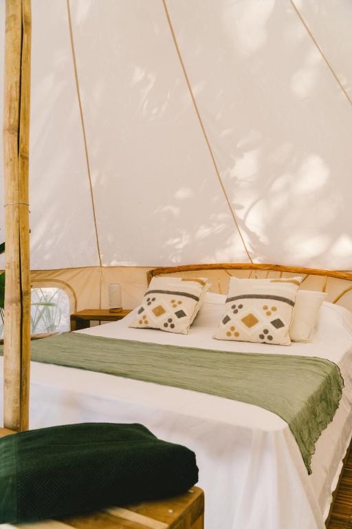 Postel nebo postele na pokoji v ubytování Parada Beach Camp