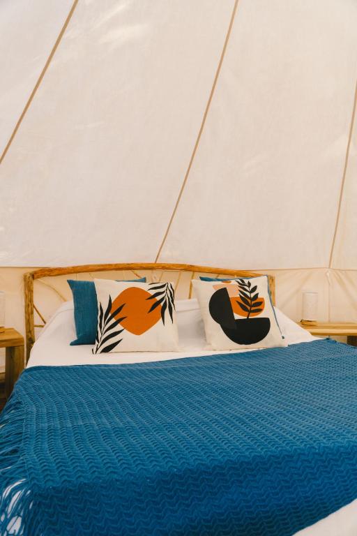 Postel nebo postele na pokoji v ubytování Parada Beach Camp