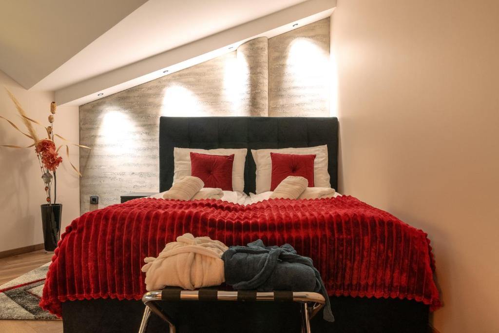 Postel nebo postele na pokoji v ubytování Fenix Apartments