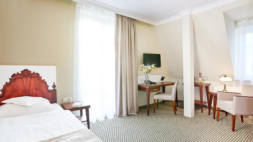 Posteľ alebo postele v izbe v ubytovaní Jantar Hotel & SPA by Zdrojowa