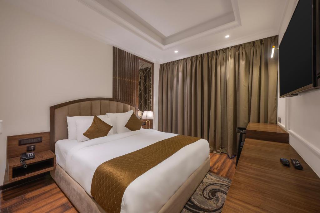 Voodi või voodid majutusasutuse Echor Baris Resort Mussoorie toas