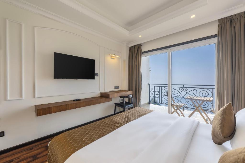 Voodi või voodid majutusasutuse Echor Baris Resort Mussoorie toas