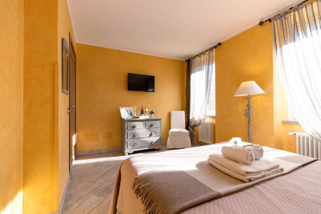 Postel nebo postele na pokoji v ubytování Residenza La Gemma