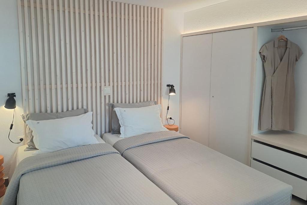 Postel nebo postele na pokoji v ubytování Atrium Villas