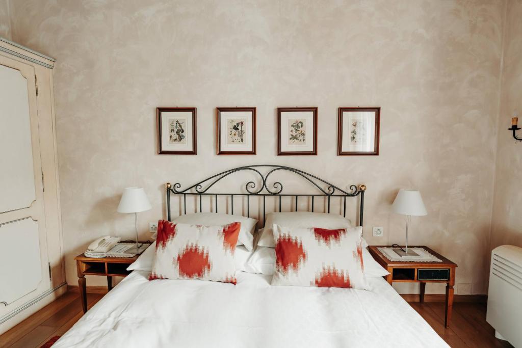 Postel nebo postele na pokoji v ubytování Romantik Hotel Castello Seeschloss