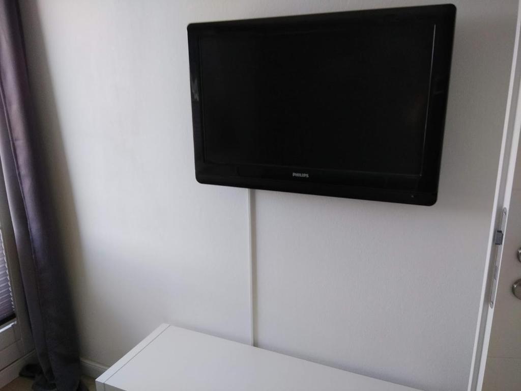 TV a/nebo společenská místnost v ubytování Meerchenhaus "Leuchtturm"