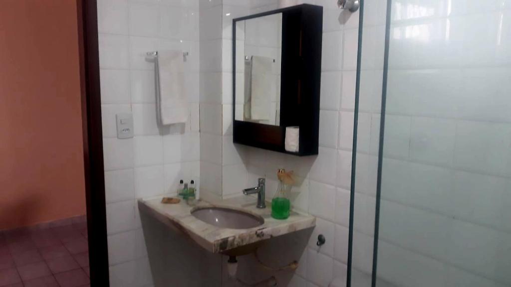 Apartamento espaçoso e aconcheganteにあるバスルーム