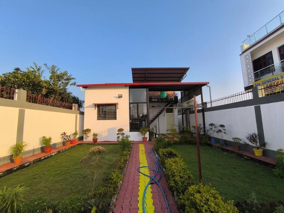 an aerial view of a house with a garden at Aditya Cottage in Rishīkesh