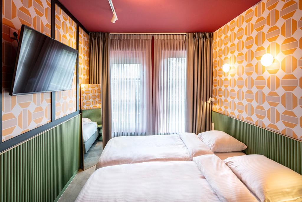 Tourist Inn Hotel Amsterdam - Resim 17