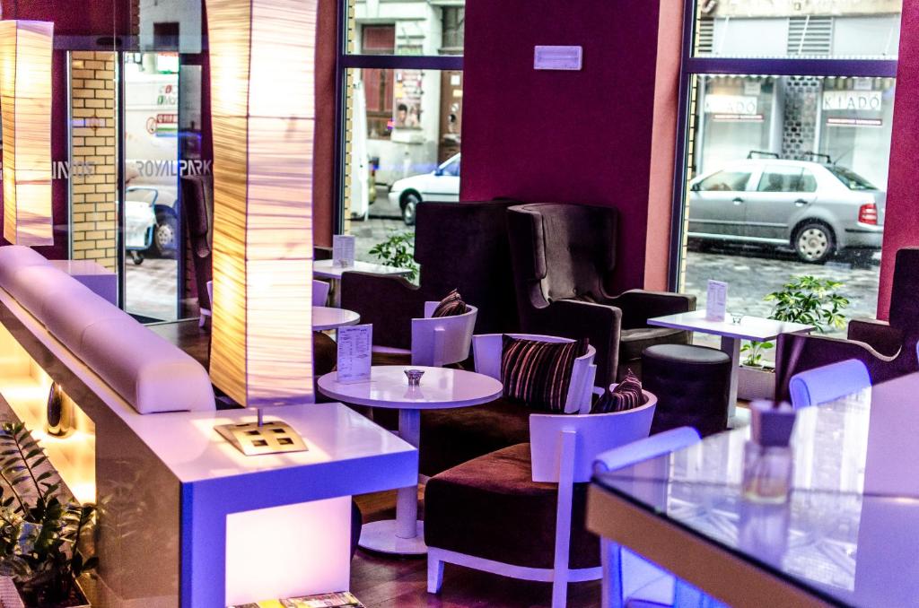 A restaurant or other place to eat at Royal Park Boutique Hotel