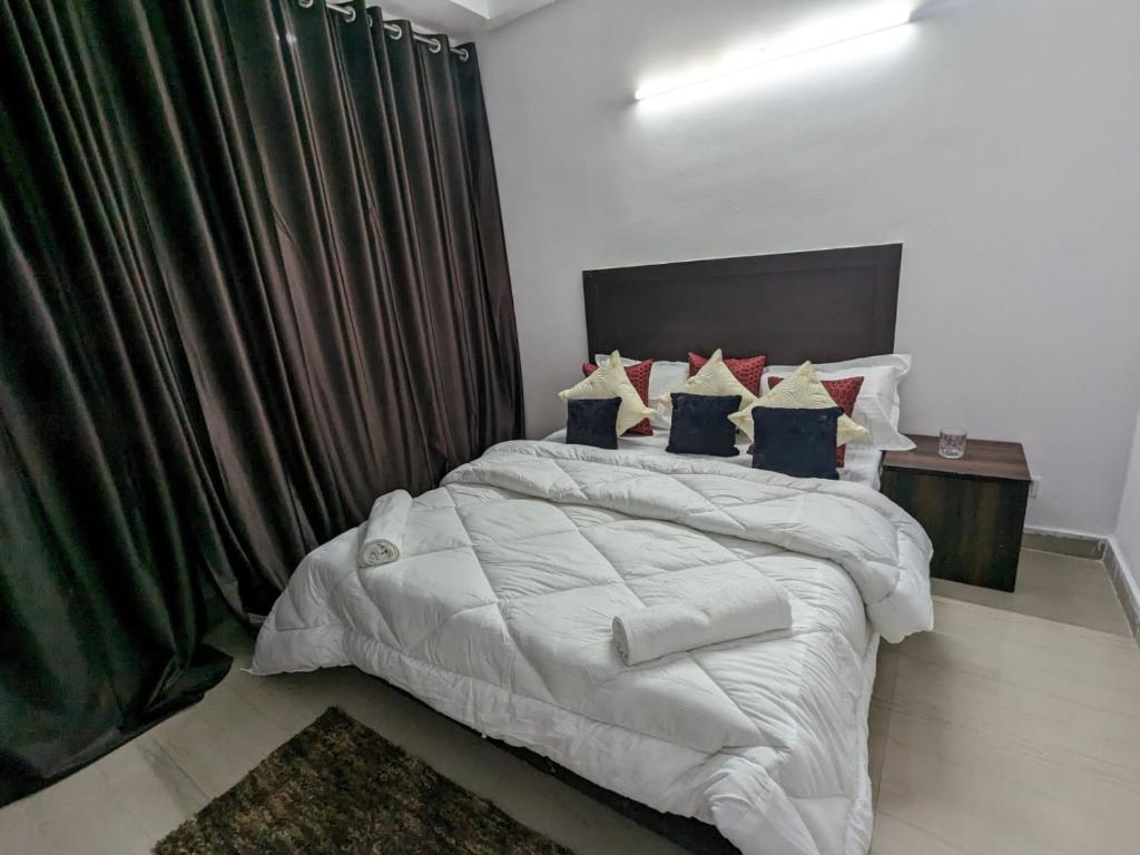 Ένα ή περισσότερα κρεβάτια σε δωμάτιο στο Ace home one