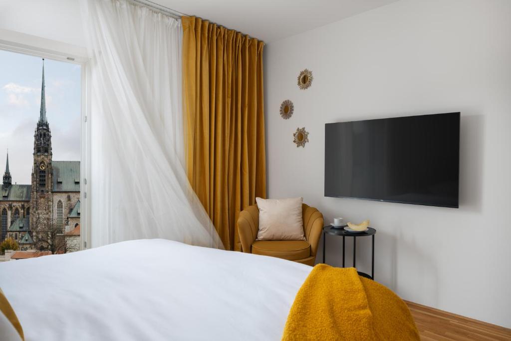 TV a/nebo společenská místnost v ubytování Zelný Trh Boutique Apartments #11 by Goodnite cz