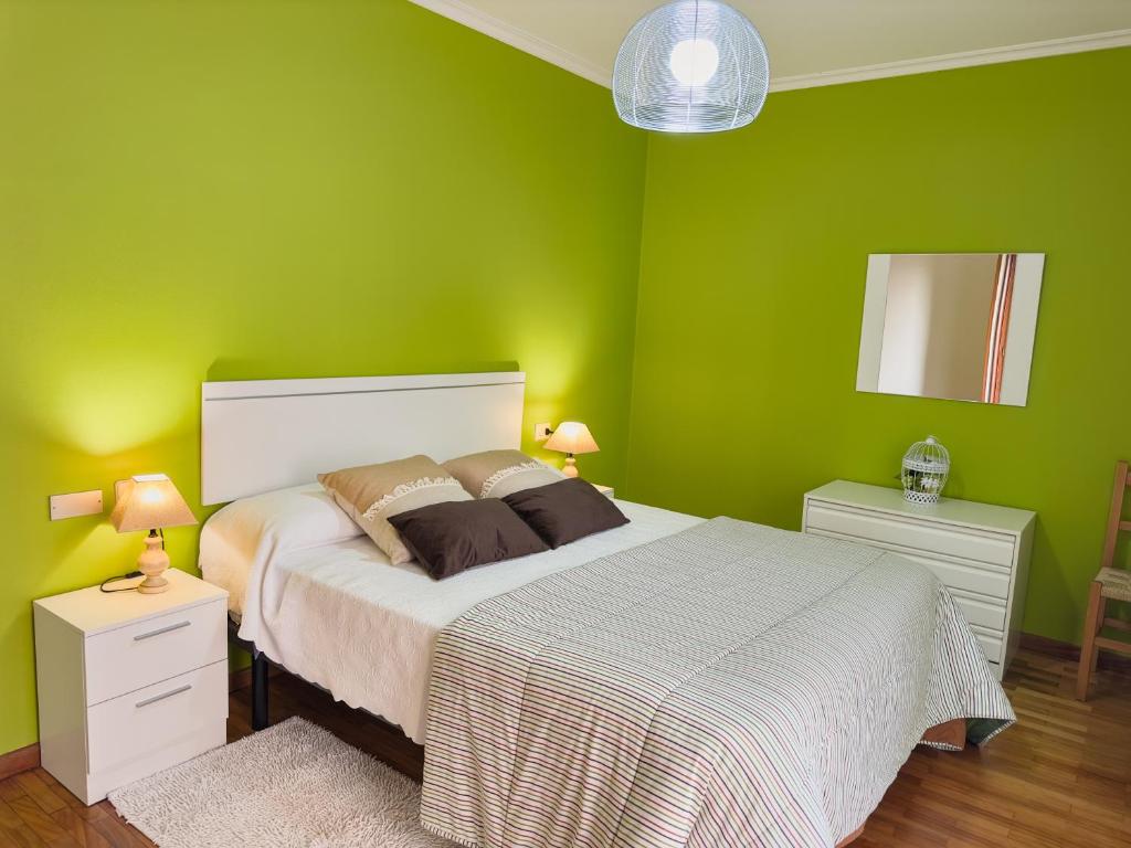 Postel nebo postele na pokoji v ubytování Apartamento Playa Panadeira Sanxenxo