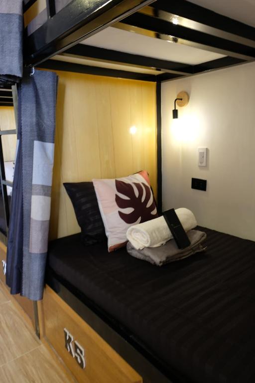 Voodi või voodid majutusasutuse Kaiz Hostel toas