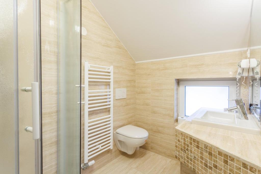 Koupelna v ubytování Hotel Vegov Hram