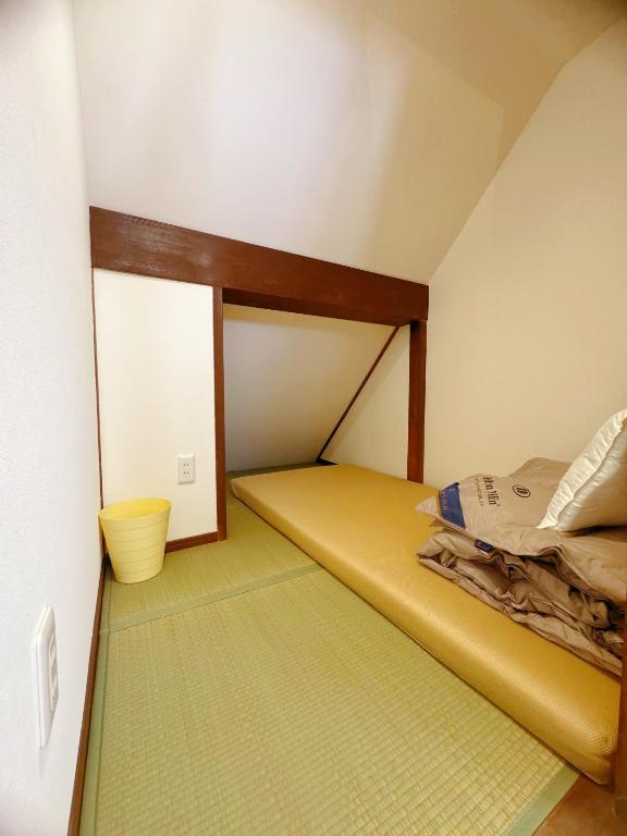 Postel nebo postele na pokoji v ubytování Amigo guest house