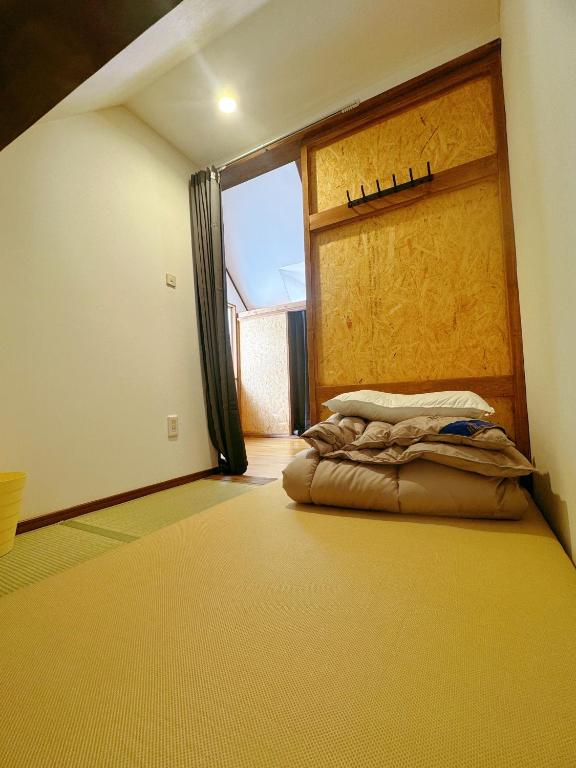 Postel nebo postele na pokoji v ubytování Amigo guest house