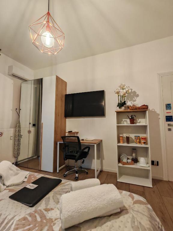 TV a/nebo společenská místnost v ubytování MC FLY ROOMS Malpensa airport