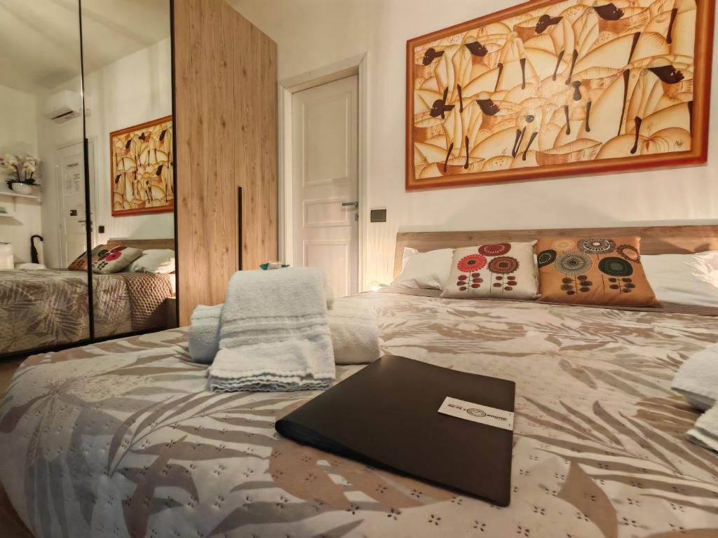 Postel nebo postele na pokoji v ubytování MC FLY ROOMS Malpensa airport
