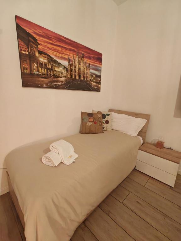 Postel nebo postele na pokoji v ubytování MC FLY ROOMS Malpensa airport