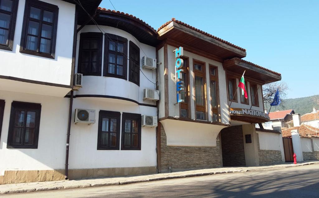 a building on the side of a street at Bozukova House in Sliven