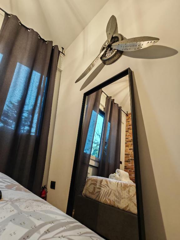 Postel nebo postele na pokoji v ubytování MC FLY ROOMS Malpensa airport