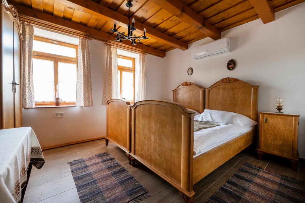 Postel nebo postele na pokoji v ubytování Szépapám háza