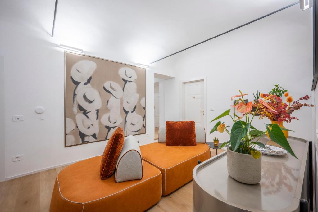 Posezení v ubytování Palazzo Garibaldi Parma Luxury Rooms & Suites