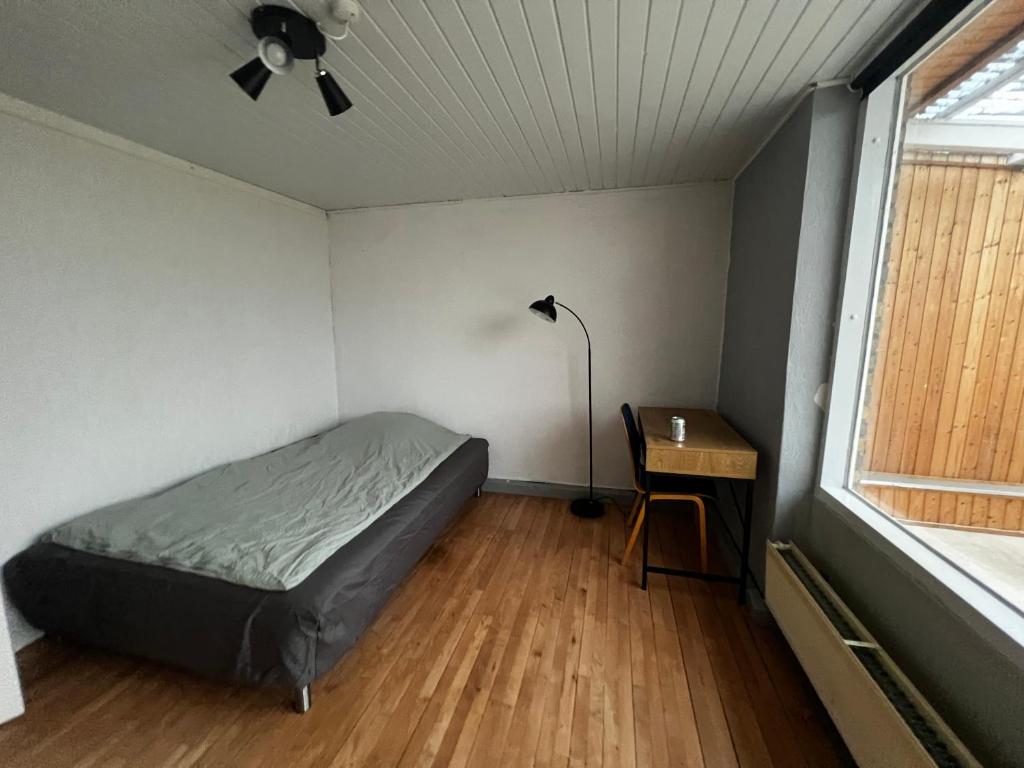 Postel nebo postele na pokoji v ubytování Cozy rooms in Rødbyhavn! Right next to Femern & Puttgarden