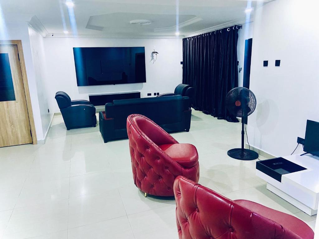TV a/nebo společenská místnost v ubytování Nexus Apartment