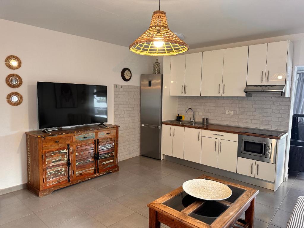 Kuchyň nebo kuchyňský kout v ubytování Apartamentos Finca Wapa