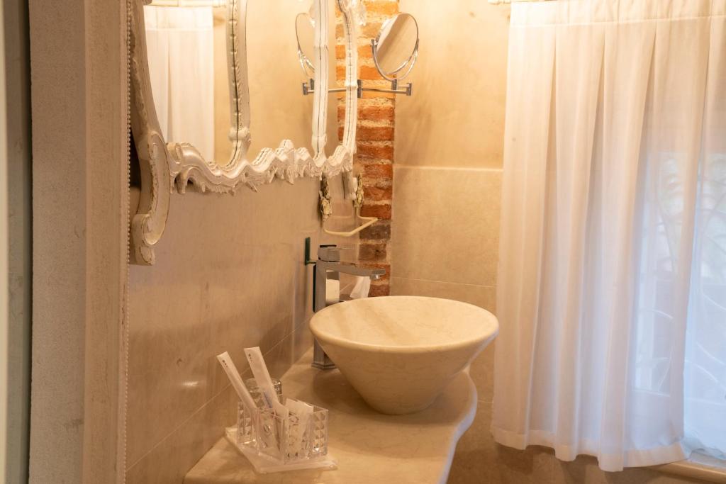 Koupelna v ubytování Regia Rosetta - Royal Rooms Borghetto