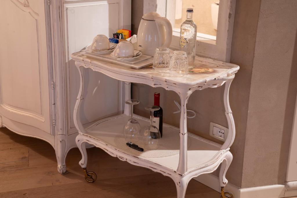 Nápoje v ubytování Regia Rosetta - Royal Rooms Borghetto