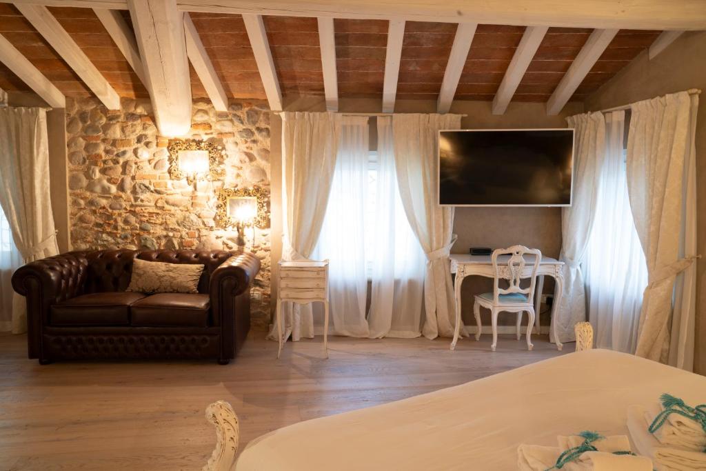 Posezení v ubytování Regia Rosetta - Royal Rooms Borghetto