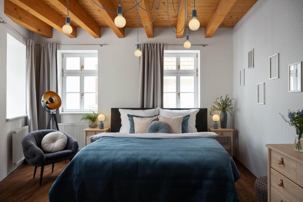 Postel nebo postele na pokoji v ubytování Zelný Trh Boutique Apartments #11 by Goodnite cz