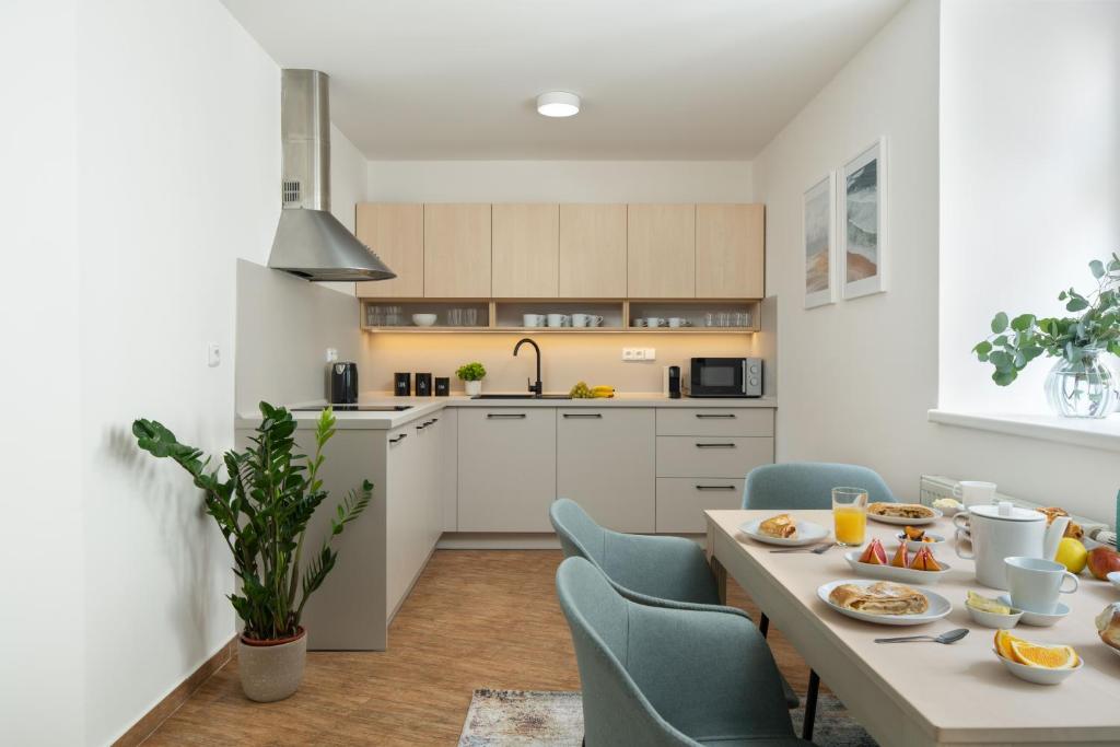 Kuchyň nebo kuchyňský kout v ubytování Zelný Trh Boutique Apartments #11 by Goodnite cz