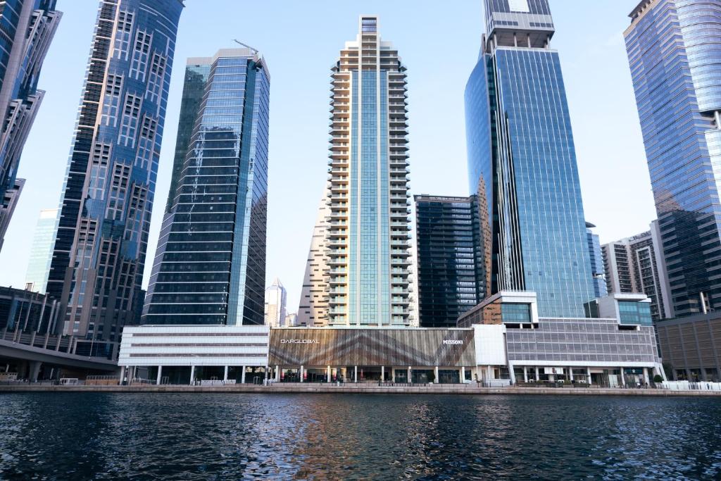 a view of a city with tall buildings at Lusso Hometels Missoni Business Bay in Dubai