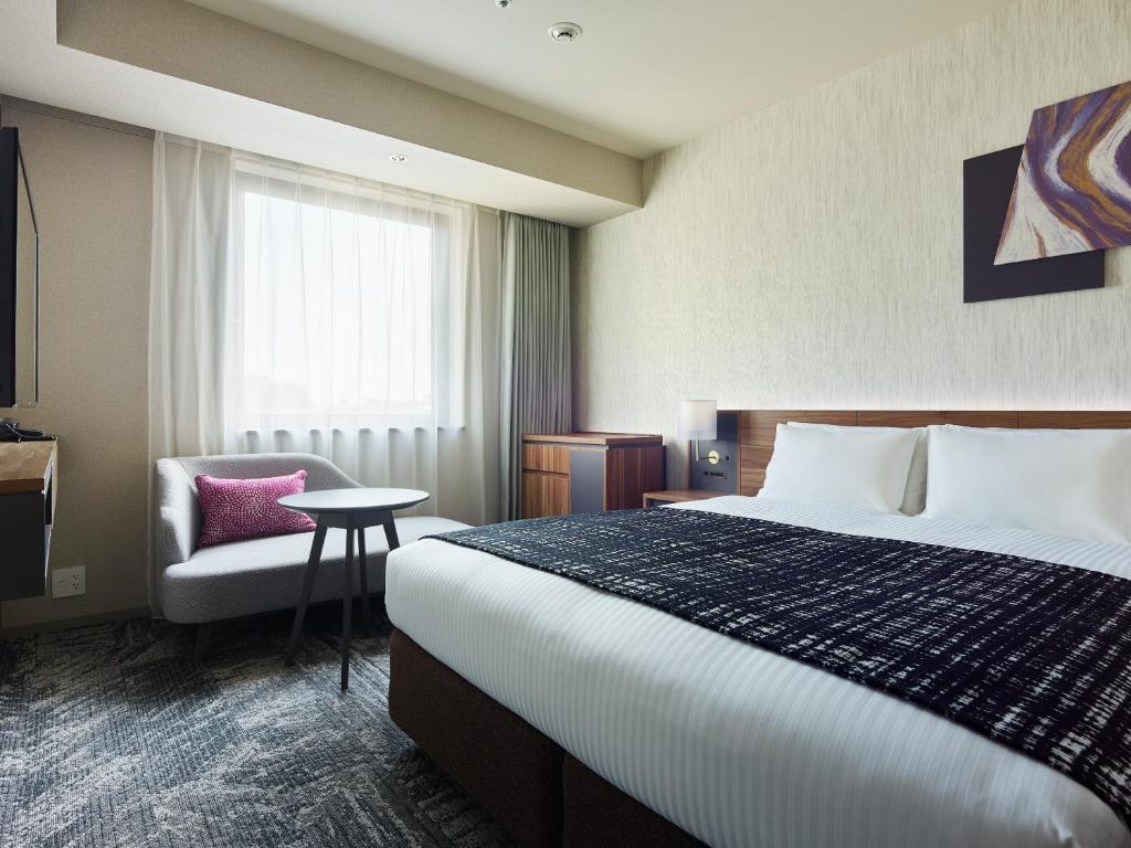 Postel nebo postele na pokoji v ubytování Mitsui Garden Hotel Gotanda - Tokyo