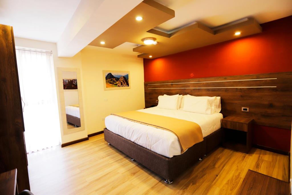 Letto o letti in una camera di INKALAM cusco