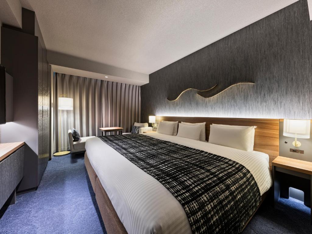 Postel nebo postele na pokoji v ubytování Mitsui Garden Hotel Gotanda - Tokyo
