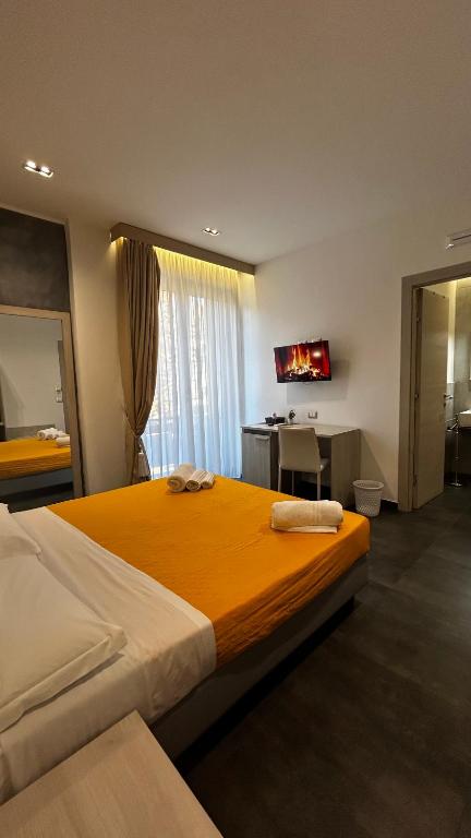 Postel nebo postele na pokoji v ubytování B&B Margherita