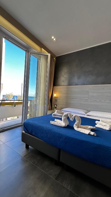 Postel nebo postele na pokoji v ubytování B&B Margherita