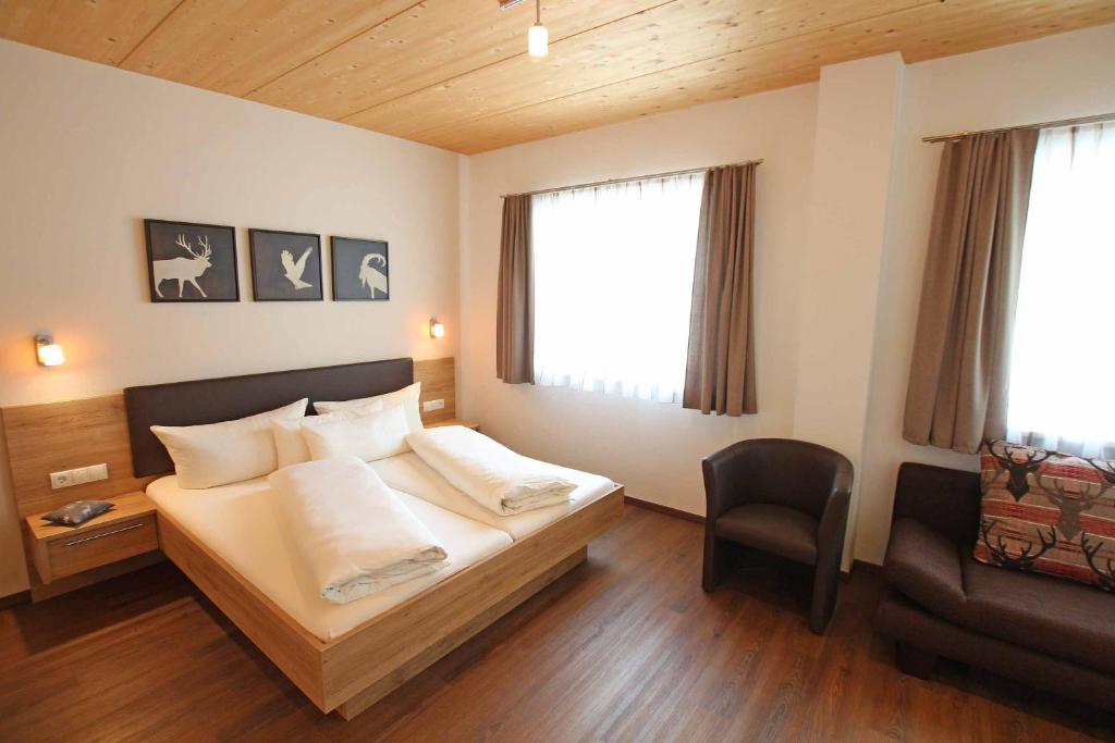 Posteľ alebo postele v izbe v ubytovaní Apart Belmont