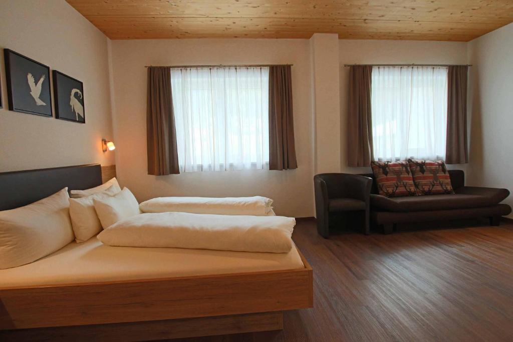 Posteľ alebo postele v izbe v ubytovaní Apart Belmont