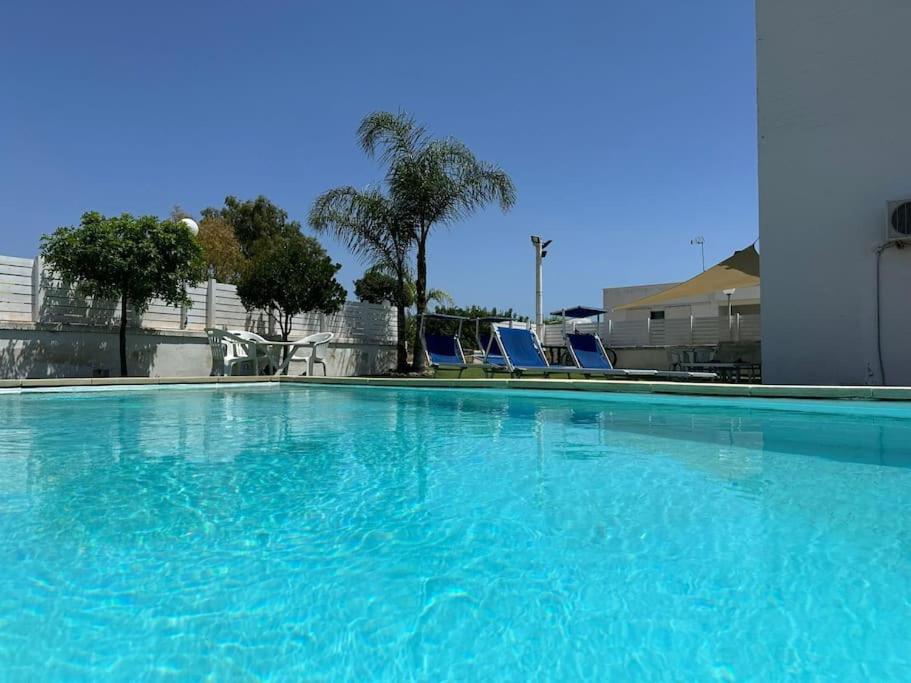 Photo de la galerie de l'établissement Villetta Loris con piscina By Apulia home, à Torre San Giovanni