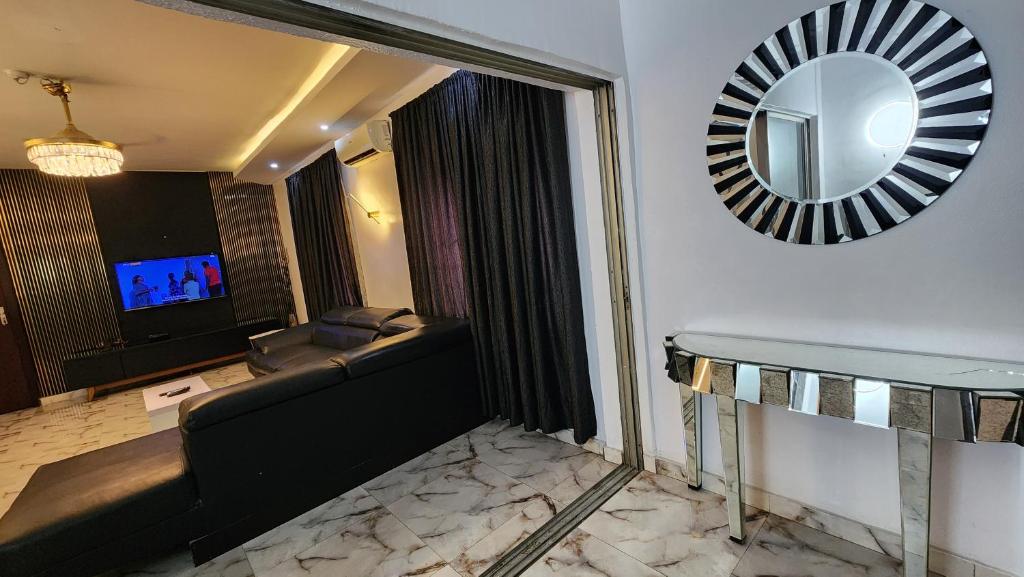 TV a/nebo společenská místnost v ubytování CG Apartments