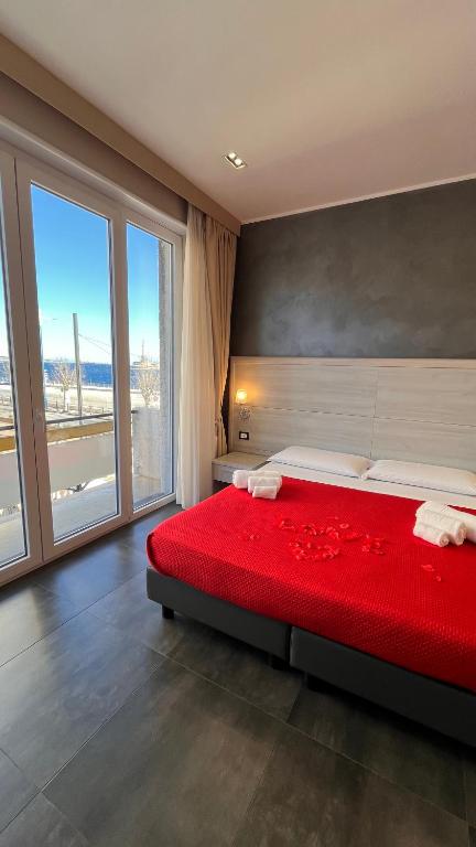 Postel nebo postele na pokoji v ubytování B&B Margherita