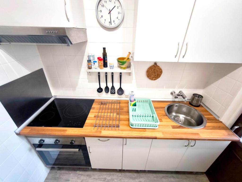 A kitchen or kitchenette at Apartamento Rivera#2